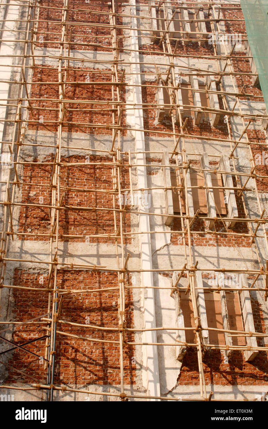 Bamboo scaffolding, scaffold, staging for building repair, Bombay, Mumbai,  Maharashtra, India Stock Photo