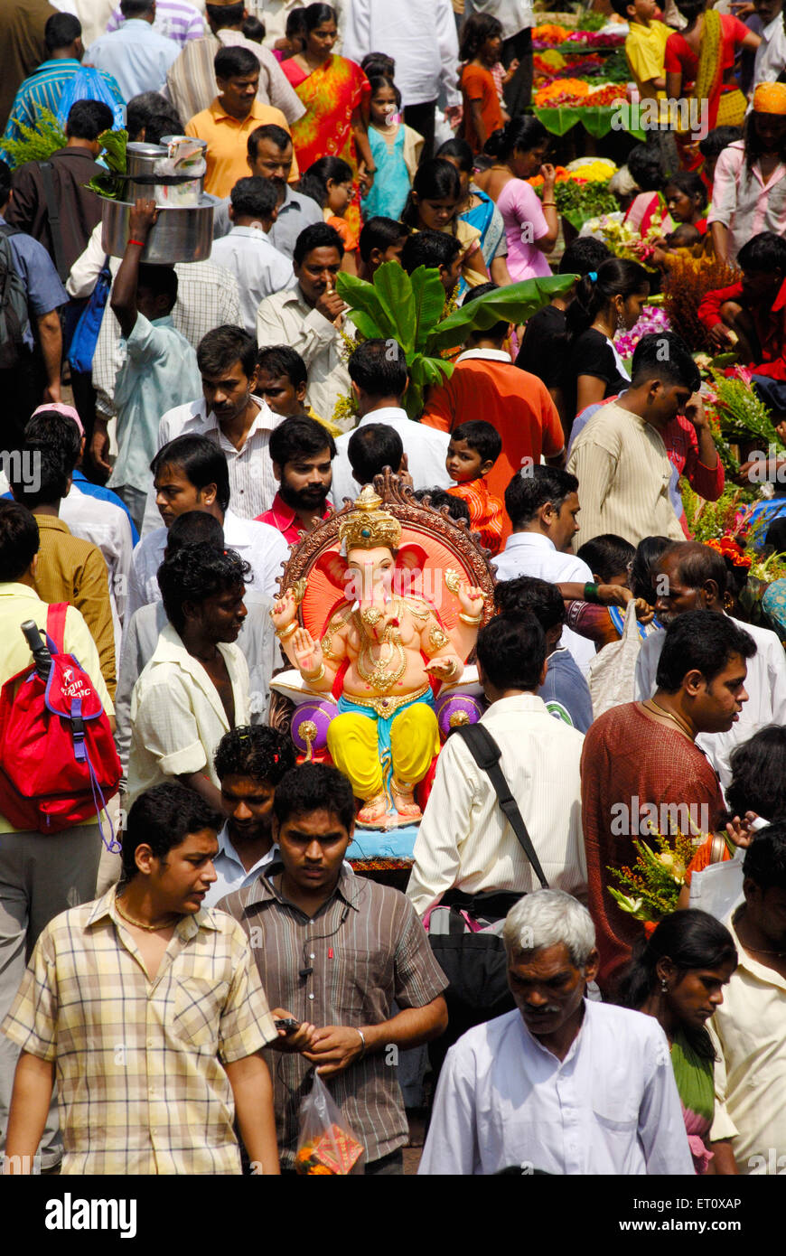 Arrival procession of idol of lord Ganesh ; Elephant headed god of Hindu ; Ganapati Festival at Dadar market ; Bombay Mumbai Stock Photo