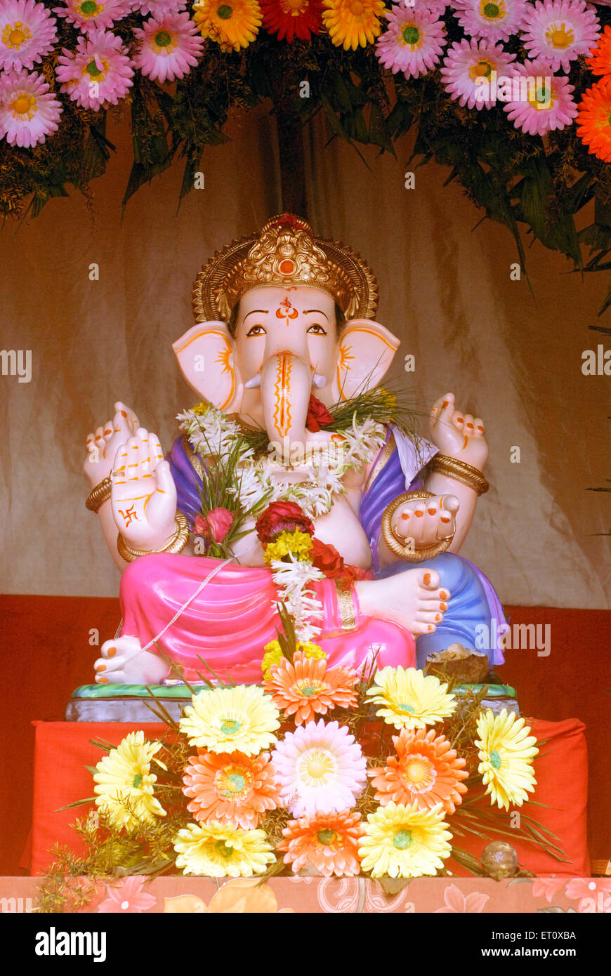 Richly decorated idol of Lord Ganesh elephant headed god ; Ganapati festival year 2008 at Pune ; Maharashtra ; India Stock Photo