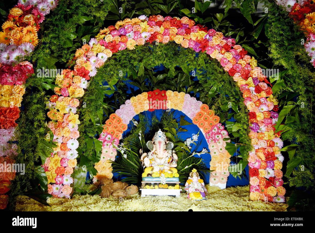 Richly decorated two idols of lord Ganesh elephant headed God ; Ganapati festival year 2008 at Pune ; Maharashtra ; India Stock Photo