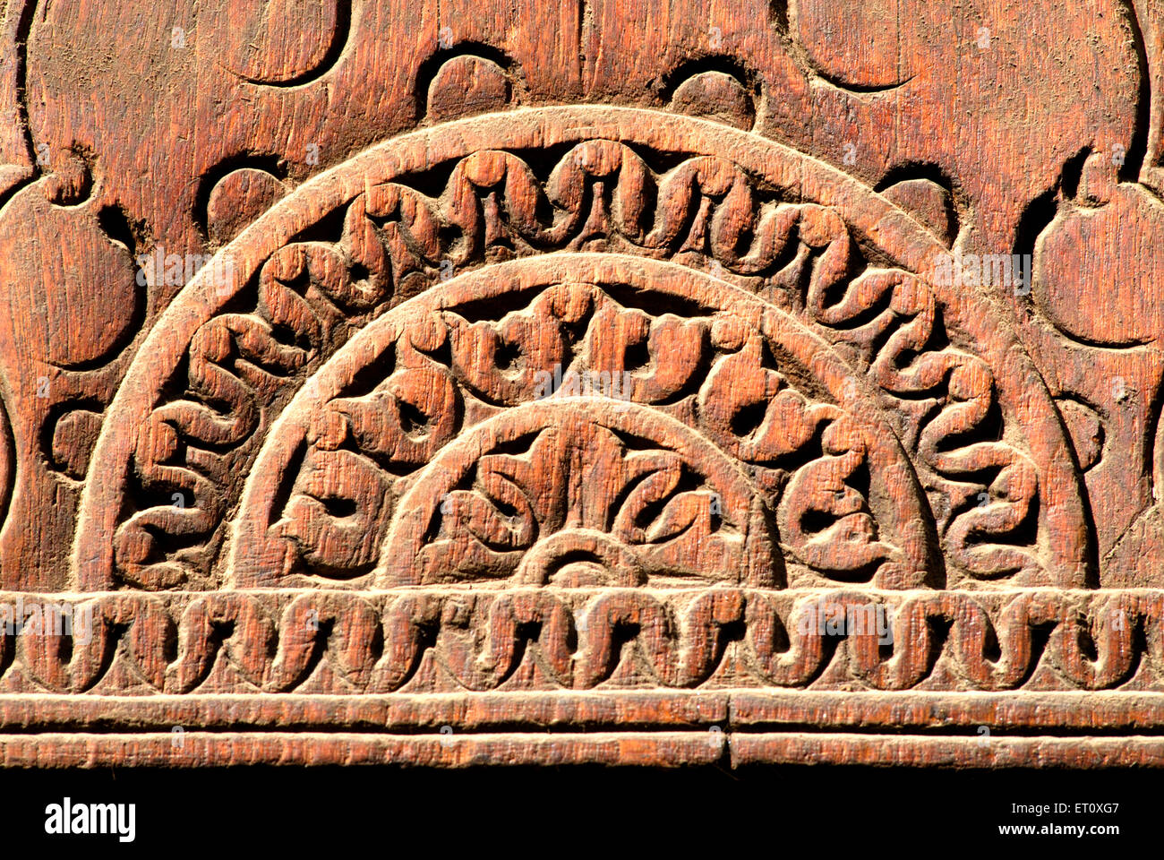 Geometrical floral design carved wooden pillar at entrance of Vishrambaug Wada second palace of Peshve the Maratha king ; Pune Stock Photo