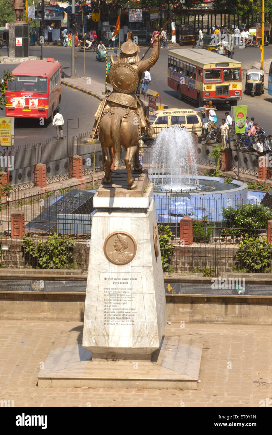 Statue of senior Thorale Bajirao Peshwe fountain and traffic view of city from top of Delhi gate darwaja ; Pune ; Maharashtra Stock Photo