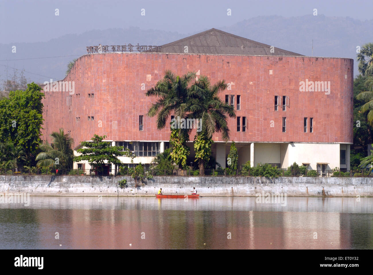 Ram Ganesh Gadkari Rangayatan Marathi drama theatre reflection in water of Masunda lake or Talao Pali ; Thane Stock Photo