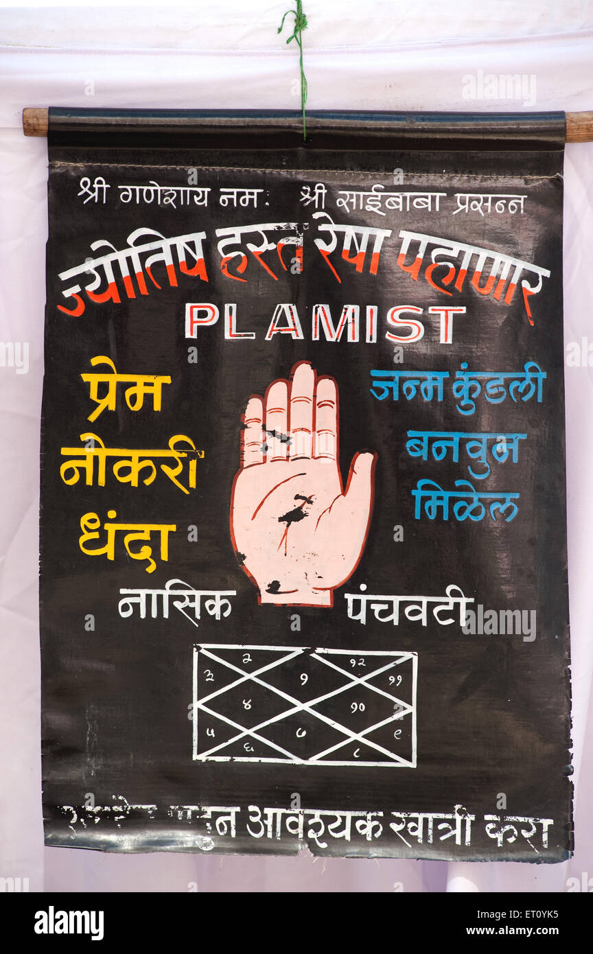 Board of palmist plamist spelling mistake at Kala Ghoda art festival ; Bombay ; Mumbai ; Maharashtra ; India ; Asia Stock Photo