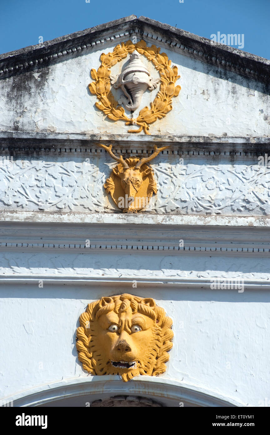 Statues carved on house ; Trivandrum ; Thiruvananthapuram ; Kerala ; India ; Asia Stock Photo