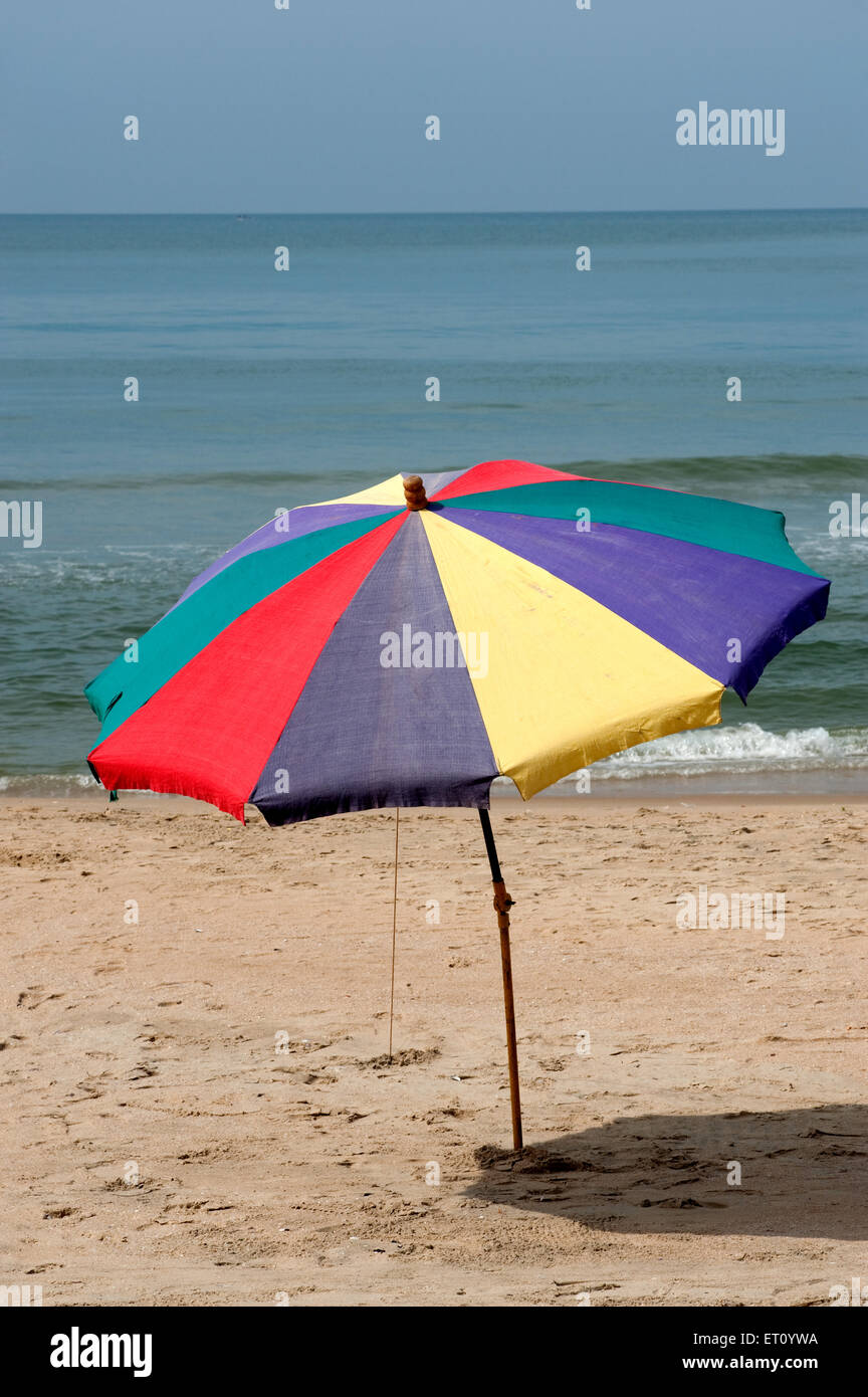 Beach umbrella, colourful umbrella at Varkala beach ; Trivandrum ;  Thiruvananthapuram ; Kerala ; India ; Asia Stock Photo