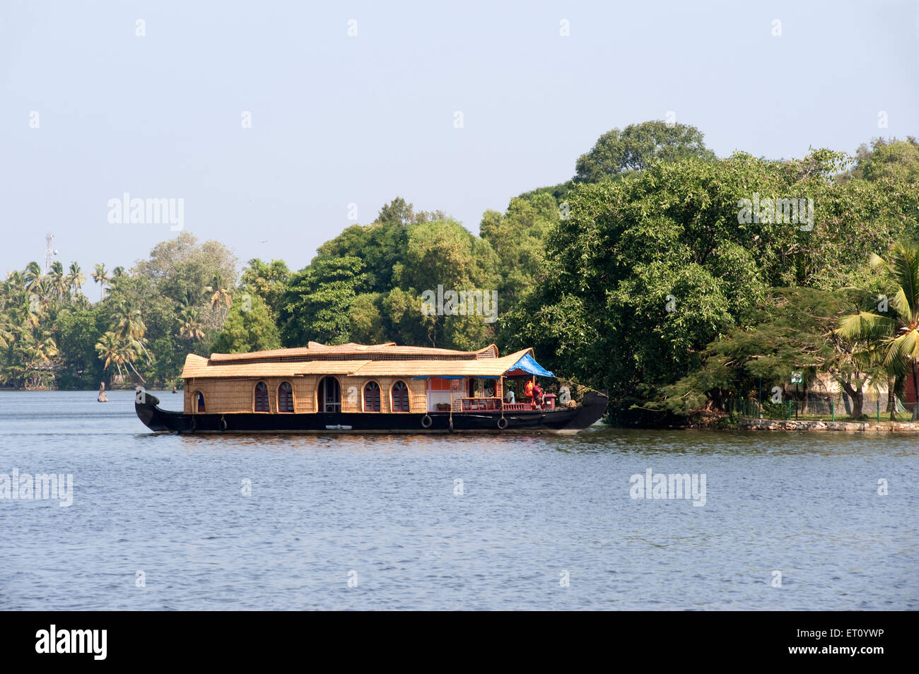 Kettuvallam converted in houseboat in backwaters ashtamudi lake ; Quilon Kollam ; Kerala ; India 2010 Stock Photo