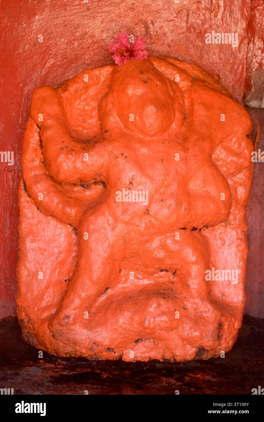 Scarlet idol of lord hanuman maruti in sinhagarh or sinhagad fort ; Pune ; Maharashtra ; India Stock Photo