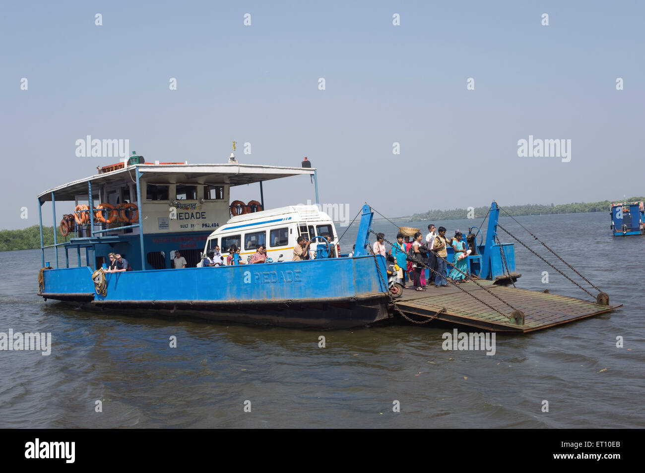 Ferry boat crossing river mandovi at velha ; Goa ; India Stock Photo