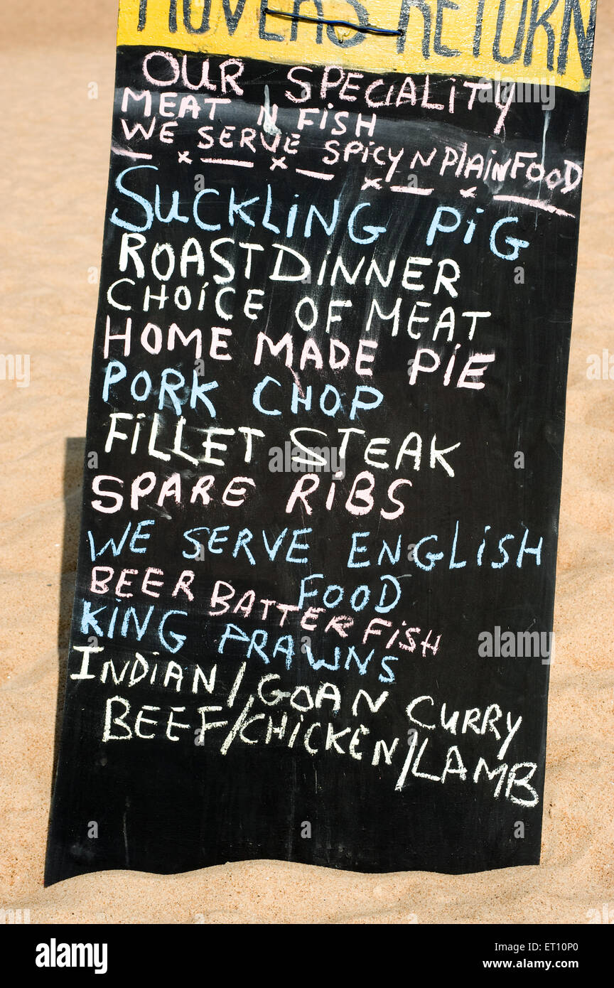 Blackboard showing menu of food dishes at Calangute beach ; Goa ; India ; Asia Stock Photo
