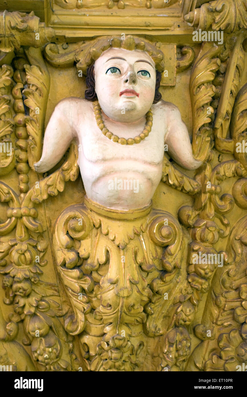 Sculpture of angel and floral design basilica of bom jesus at velha ; Goa ; India Stock Photo