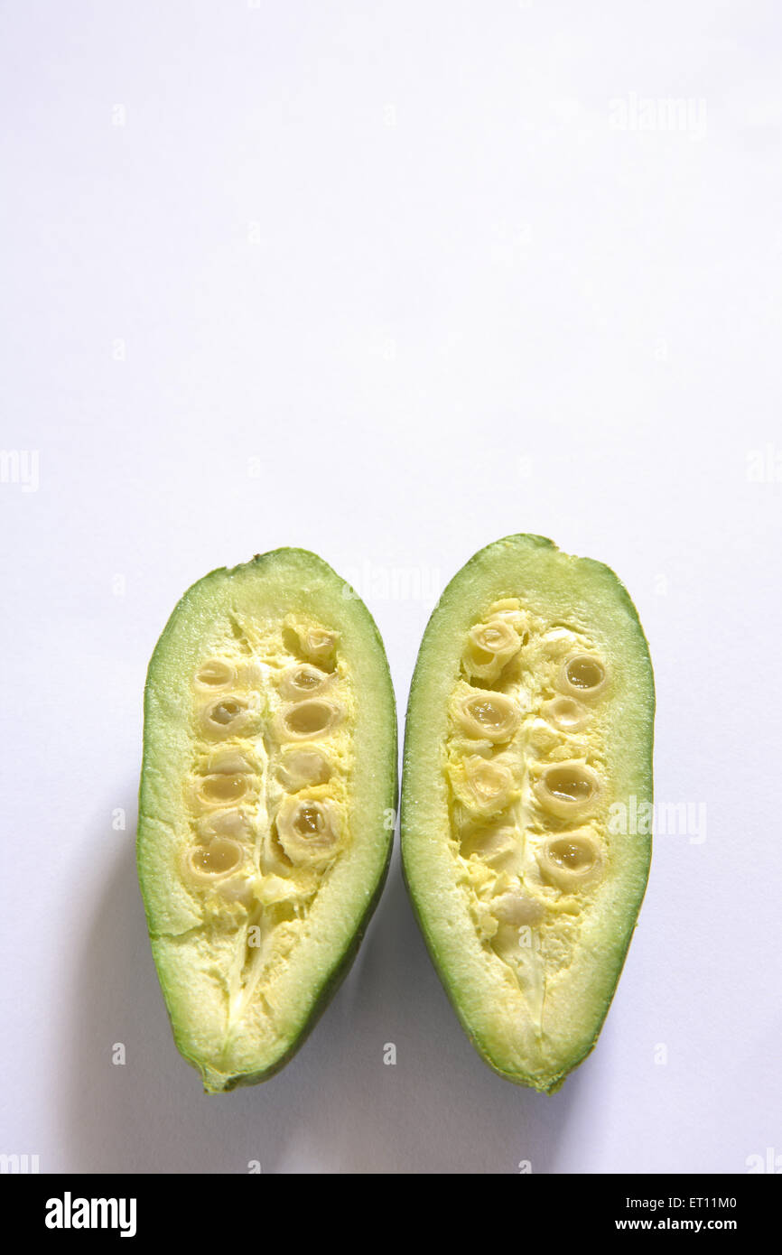 Vegetable ; half striped pear gourds parwal on white background Stock