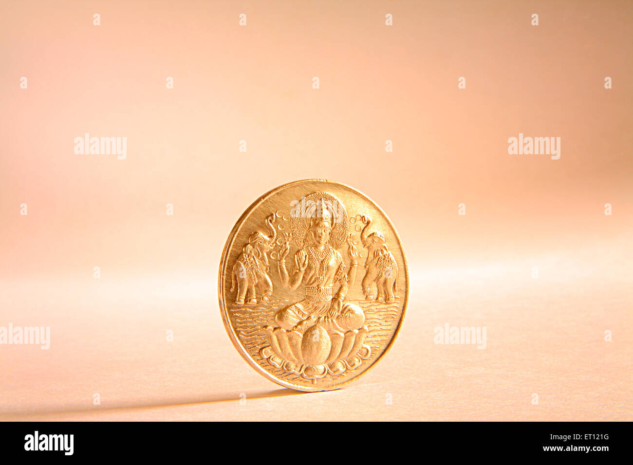 Gold coin with Goddess Lakshmi picture Stock Photo