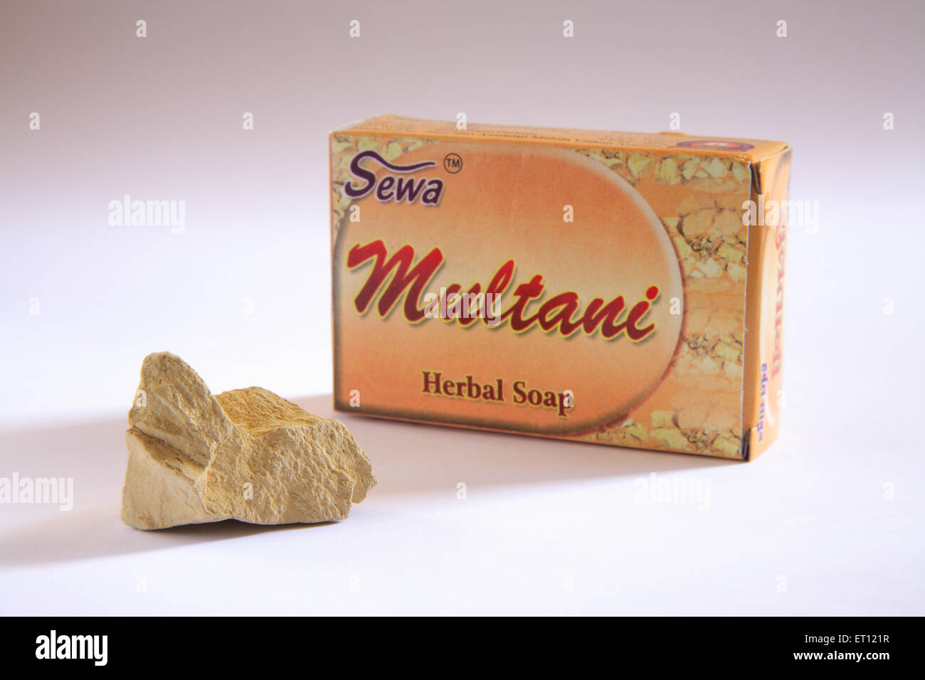 Sewa multani herbal soap and stone on white background Stock Photo
