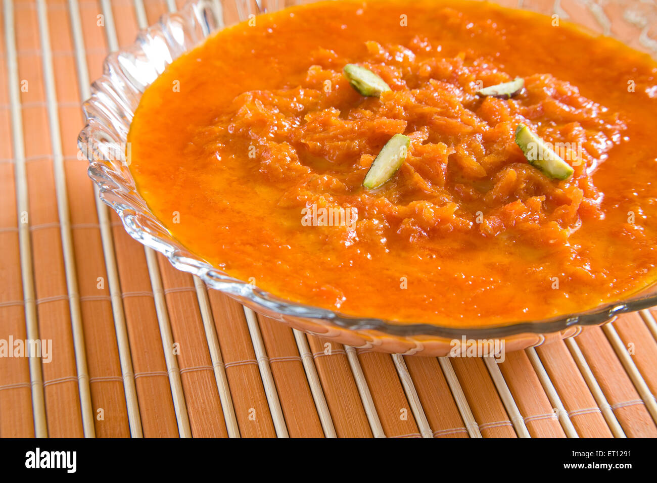 Indian food ; sweet dessert carrots pudding garnish with pistachio served in bowl 19 February 2010 Stock Photo