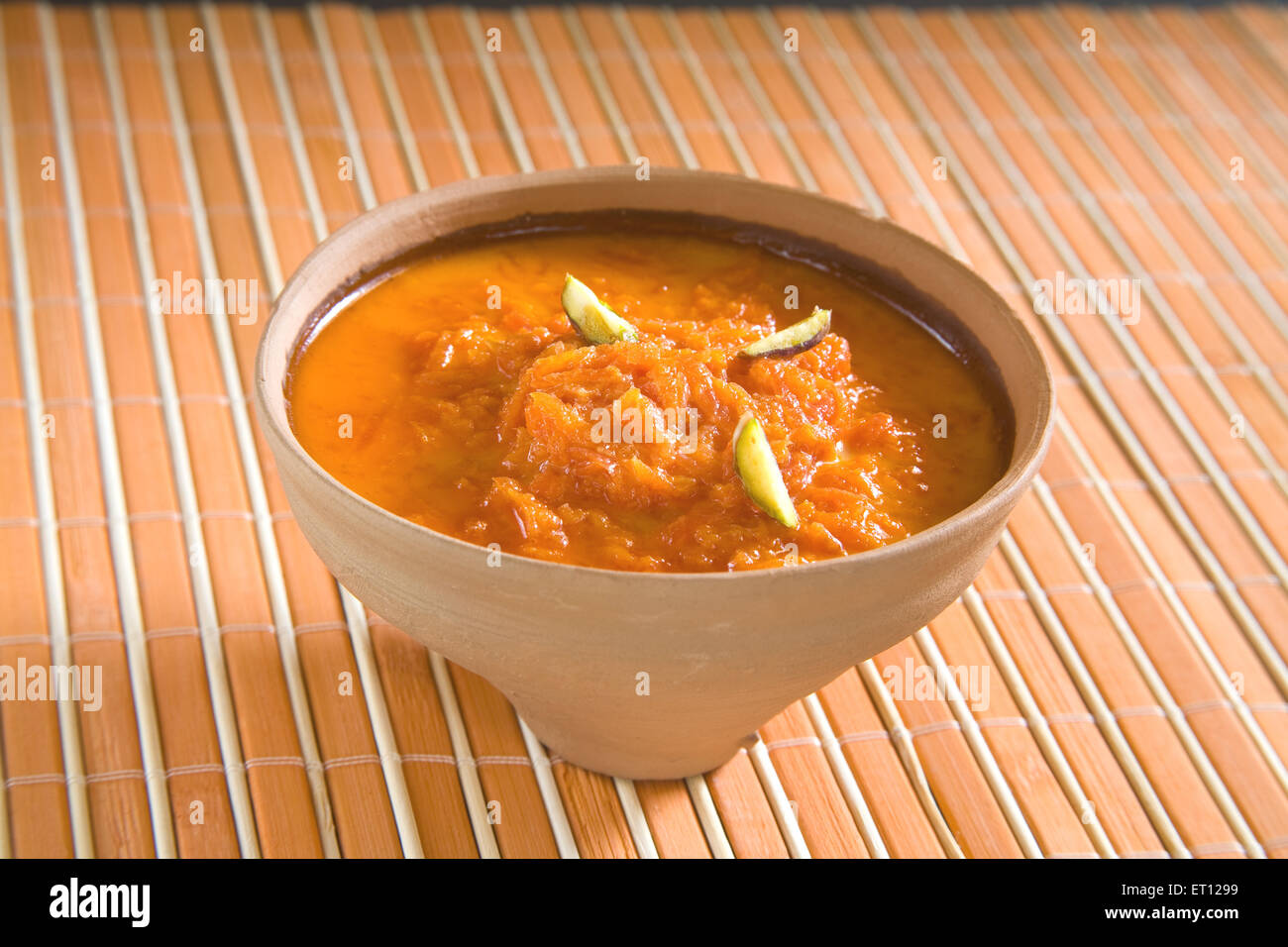 Indian food ; sweet dessert carrots pudding garnish with pistachio