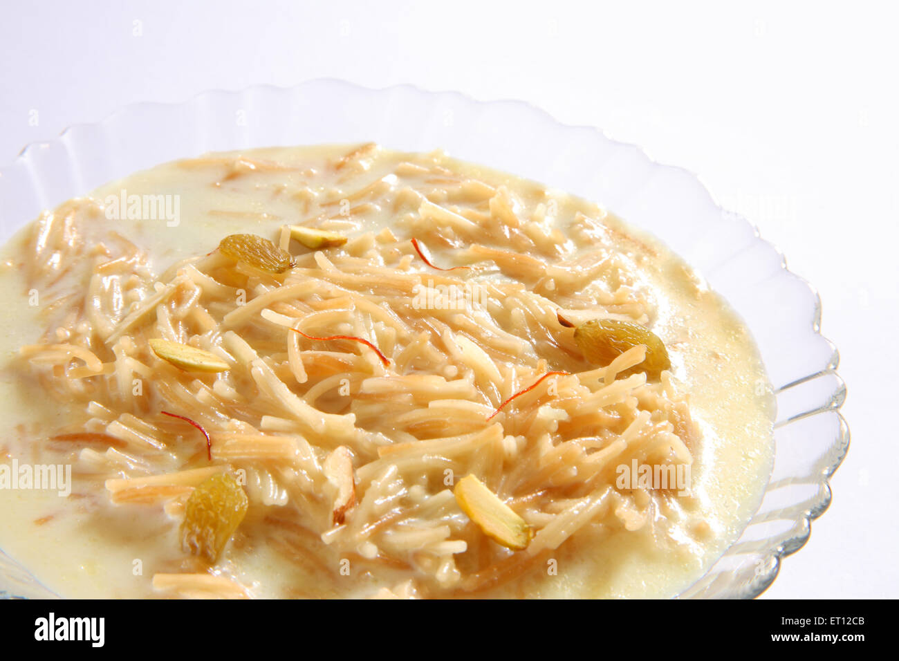 vermicelli pudding , sweet sevian , milk nuts saffron in bowl on white