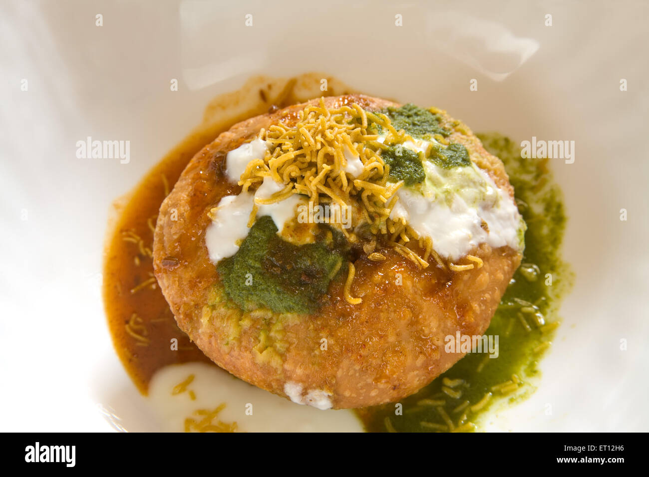 Indian snack fried shahi khasta kachori chaat yogurt green coriander