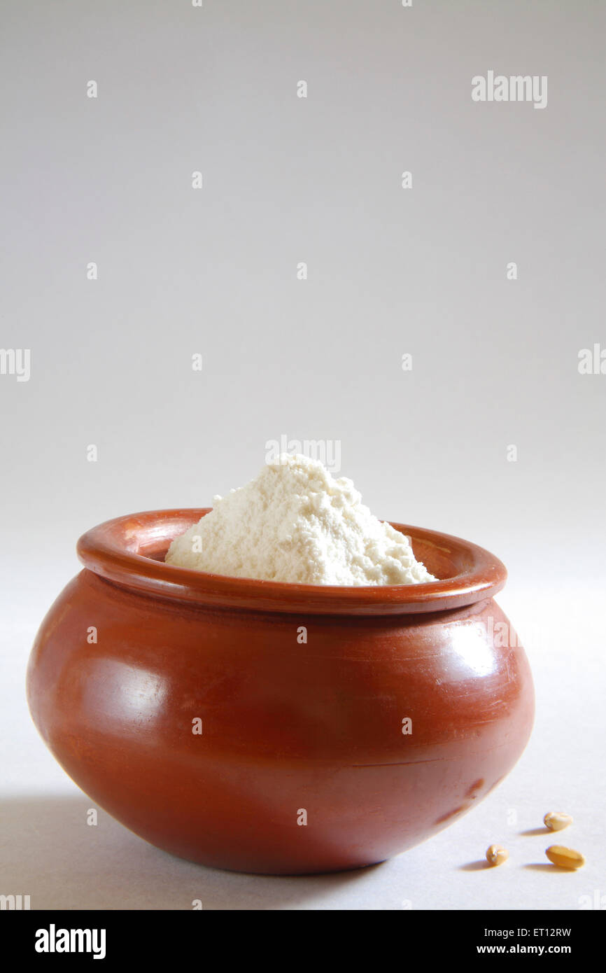 Maida ; wheat flour in clay pot ; India Stock Photo Alamy