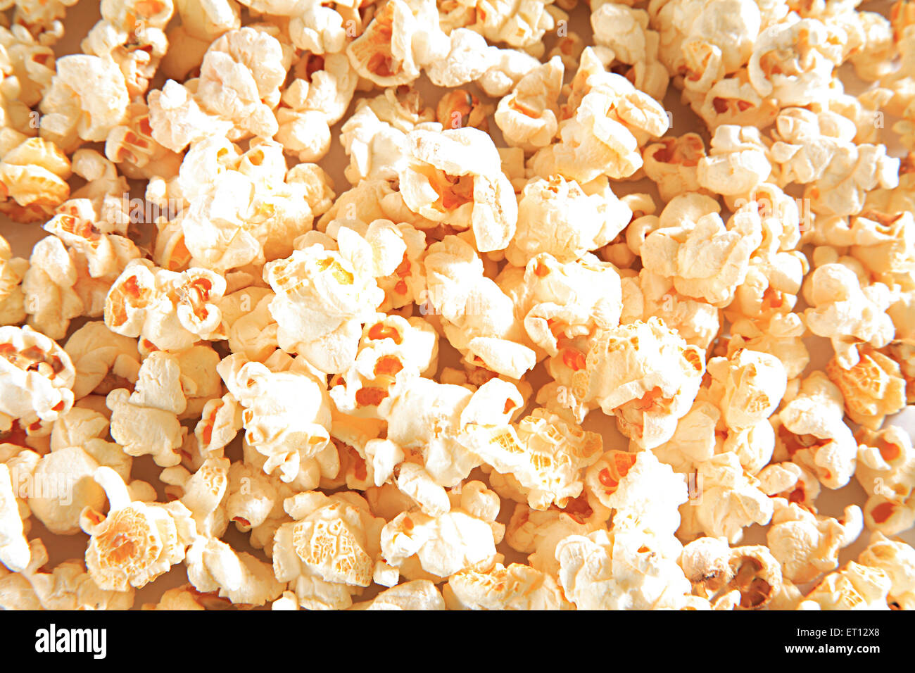 popcorn snack , corn kernel , maize which puffs after heating Stock Photo