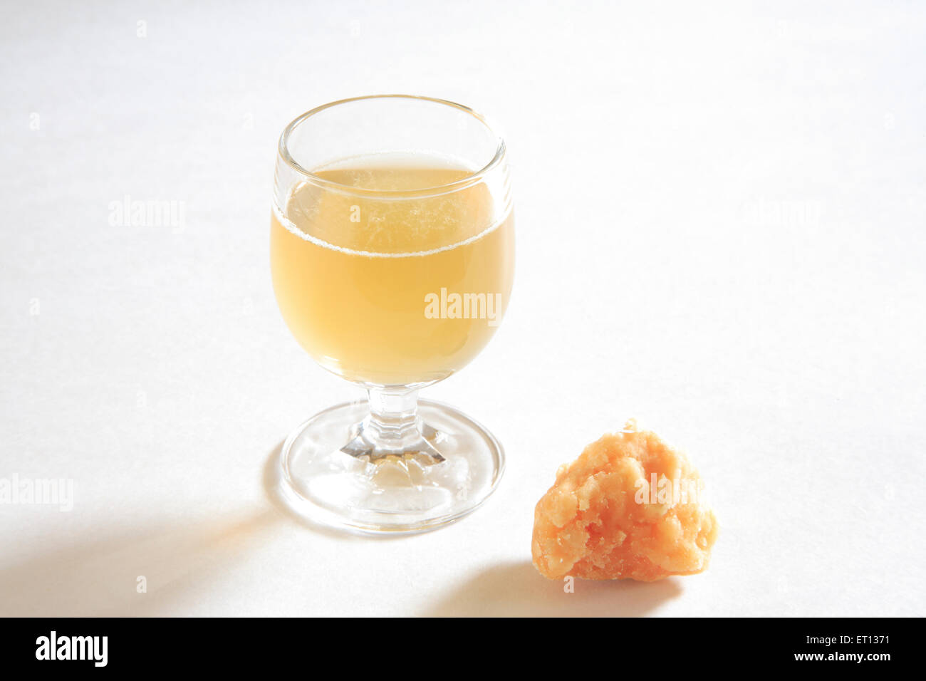 Cold drink ; jaggery juice ; Saccharum Officinarum ; India Stock Photo
