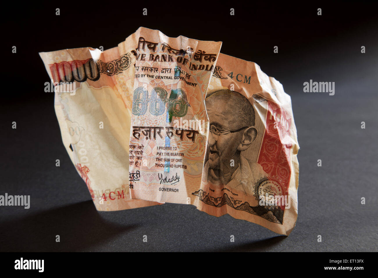 Indian money currency paper one thousand Rupee note 1000 crumpled Stock Photo