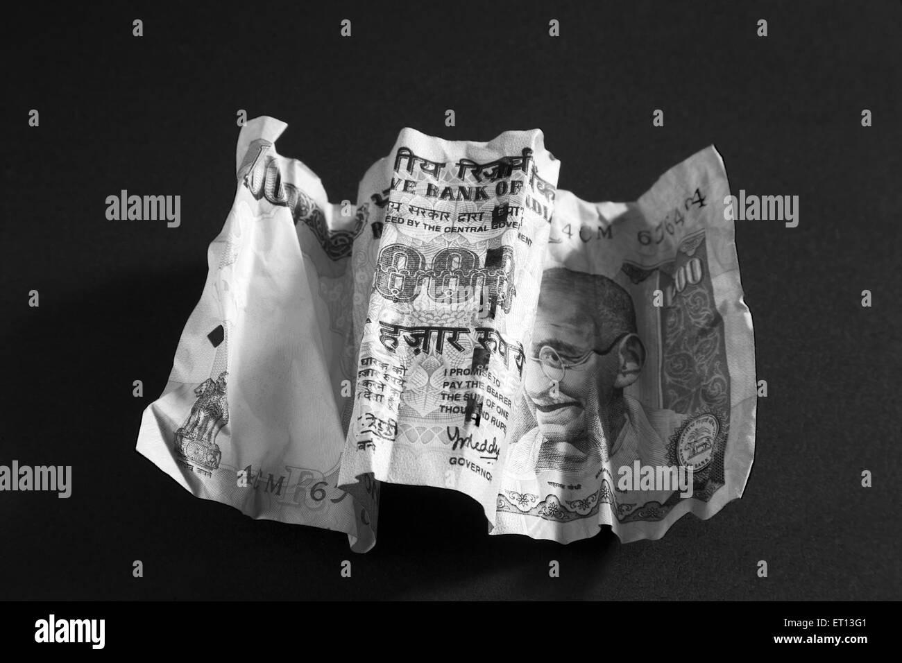 Indian money currency paper one thousand Rupee note 1000 crumpled Stock Photo