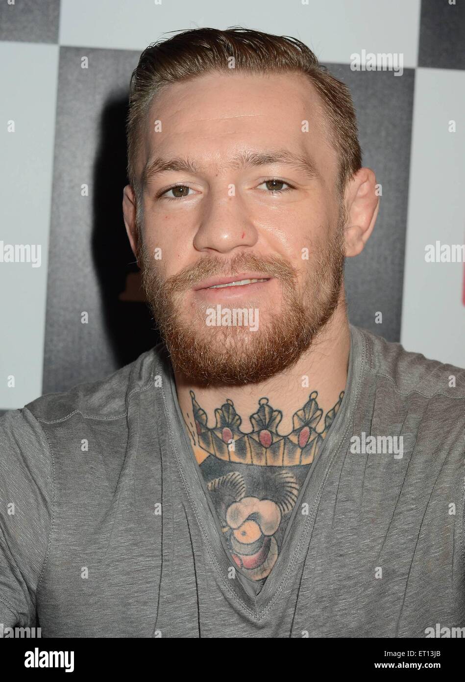 UFC fighter Conor McGregor signs copies of his DVD documentary 'Notorious'  at HMV Featuring: Conor McGregor Where: Dublin, Ireland When: 06 Dec 2014  Credit: WENN.com Stock Photo - Alamy