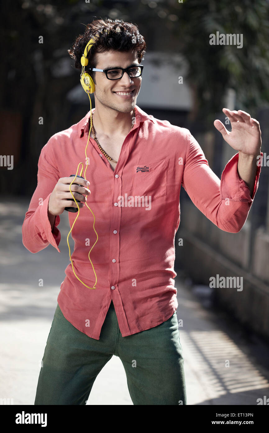 Man Listening Music with Dance India Asia MR#790E Stock Photo
