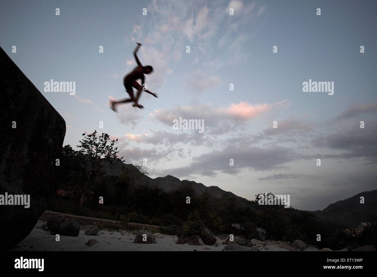 Boy diving ; Rishikesh ; Uttaranchal Uttarakhand ; India Stock Photo Alamy