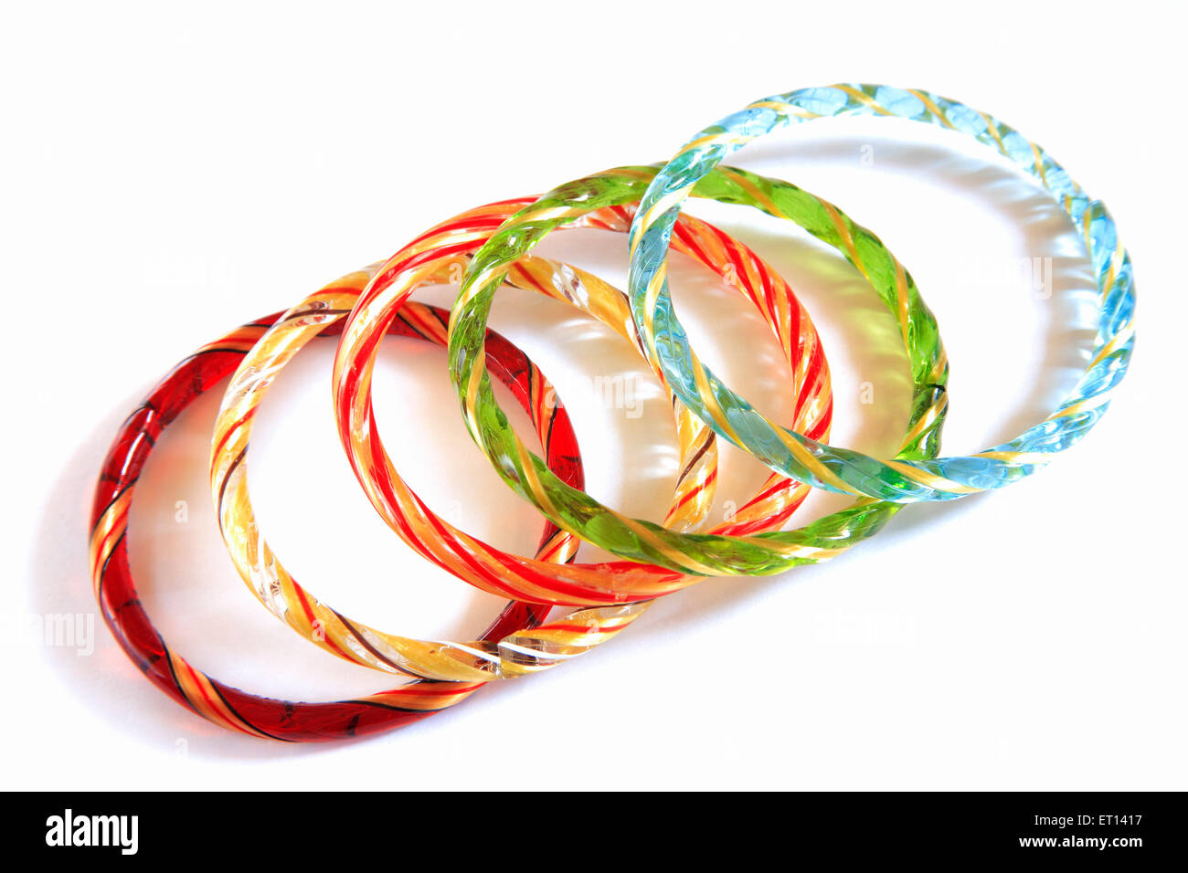 Colorful glass bangles on white background Stock Photo Alamy