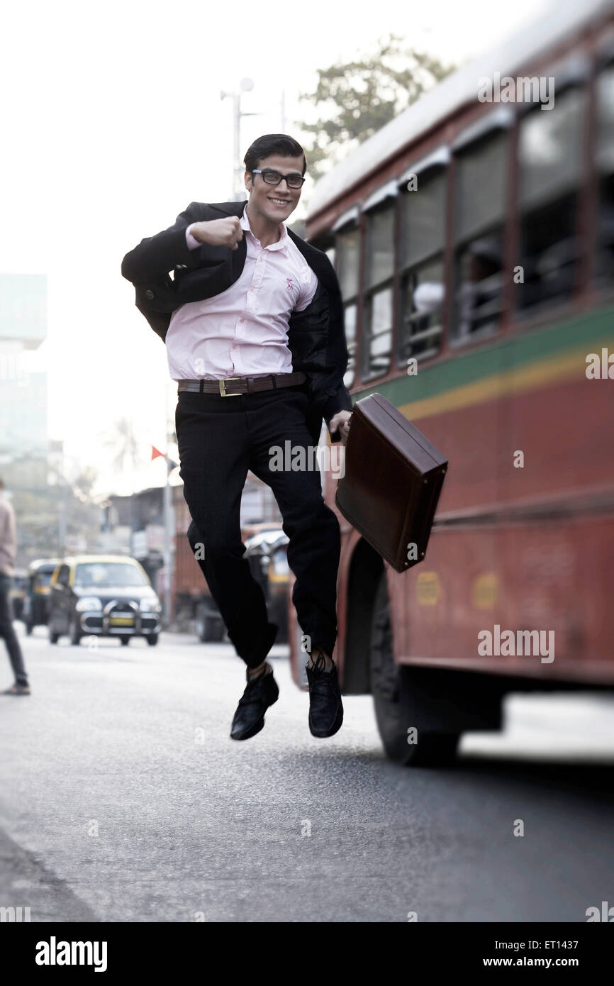 Man Jumping on the Road India Asia MR#790E Stock Photo