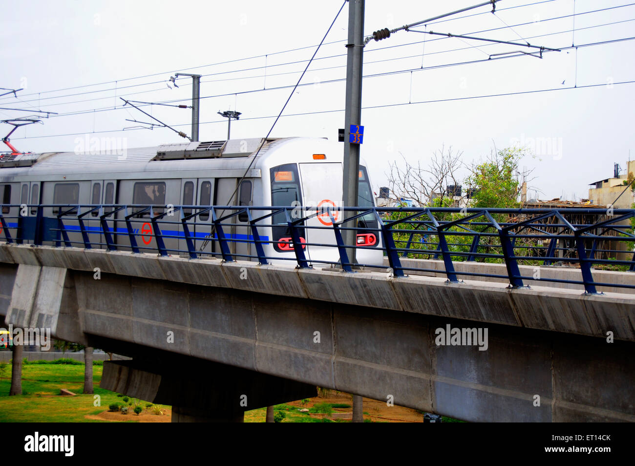 Metro train on bridge ; New Delhi ; India Stock Photo