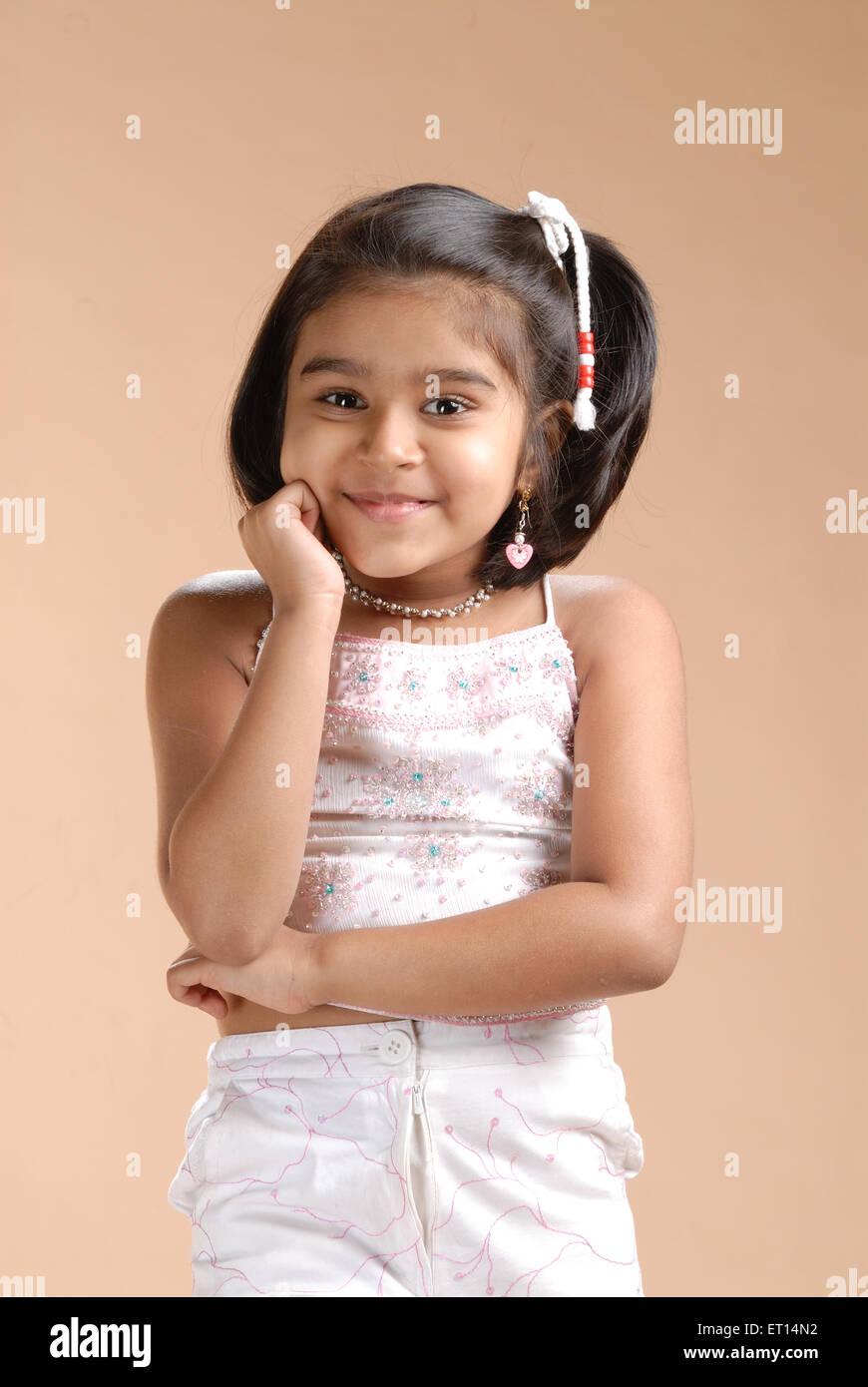 Young girl looking at camera MR#719D Stock Photo - Alamy