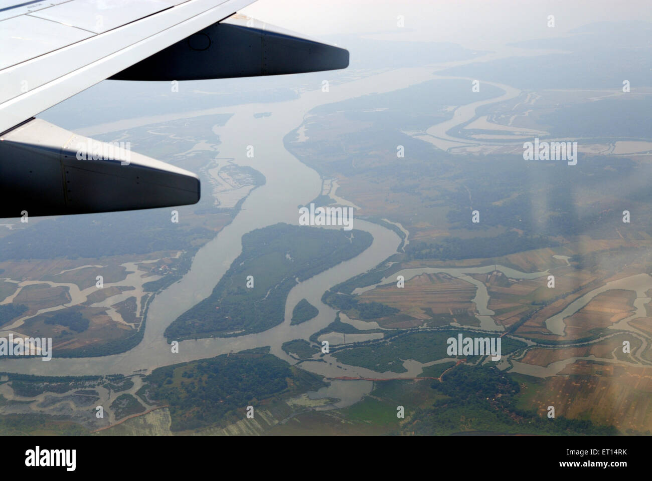Aerial view of aircraft wing and river, Goa, India Stock Photo - Alamy