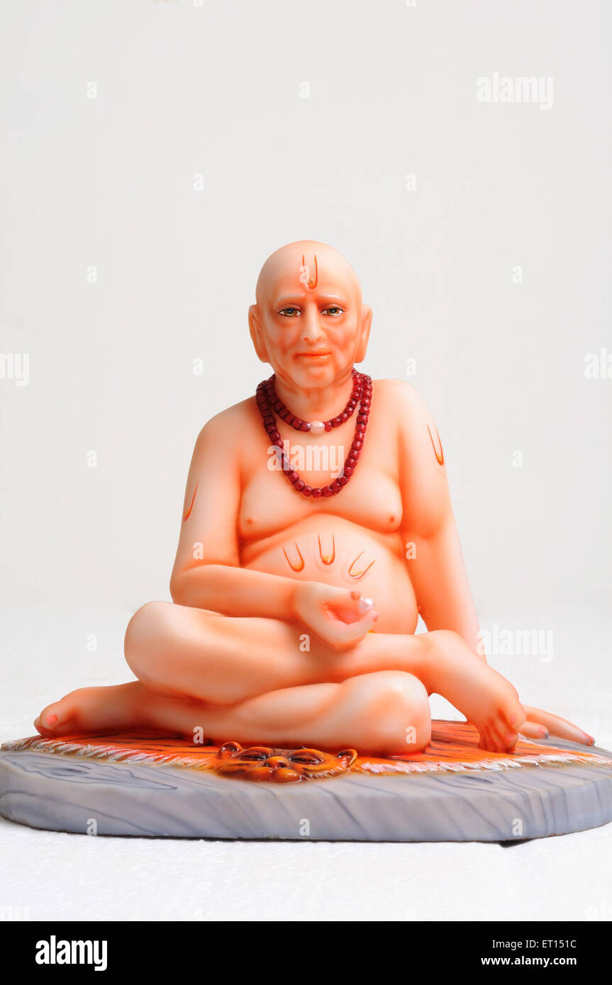 Clay statue of god shri swami samarth sitting on tiger skin Stock Photo