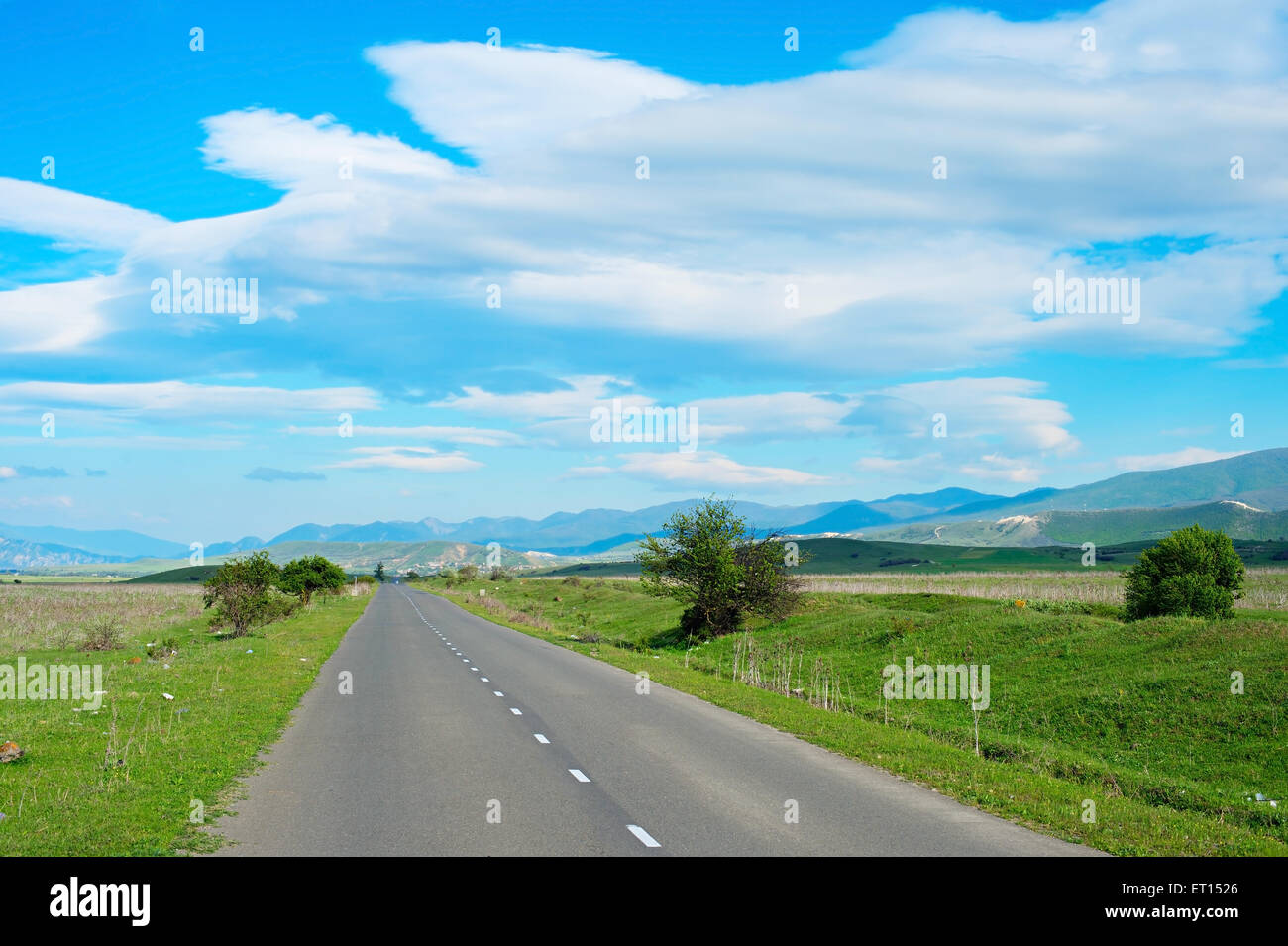 Country road in in the bright sunny day Stock Photo Alamy