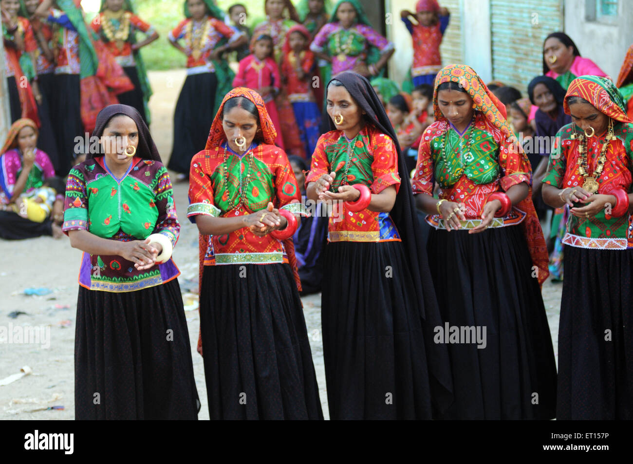 Rural women performing garbas during saatam aatham puja celebration at Mindiyada near Anjaar ; Kutch ; Gujarat ; India NO MR Stock Photo