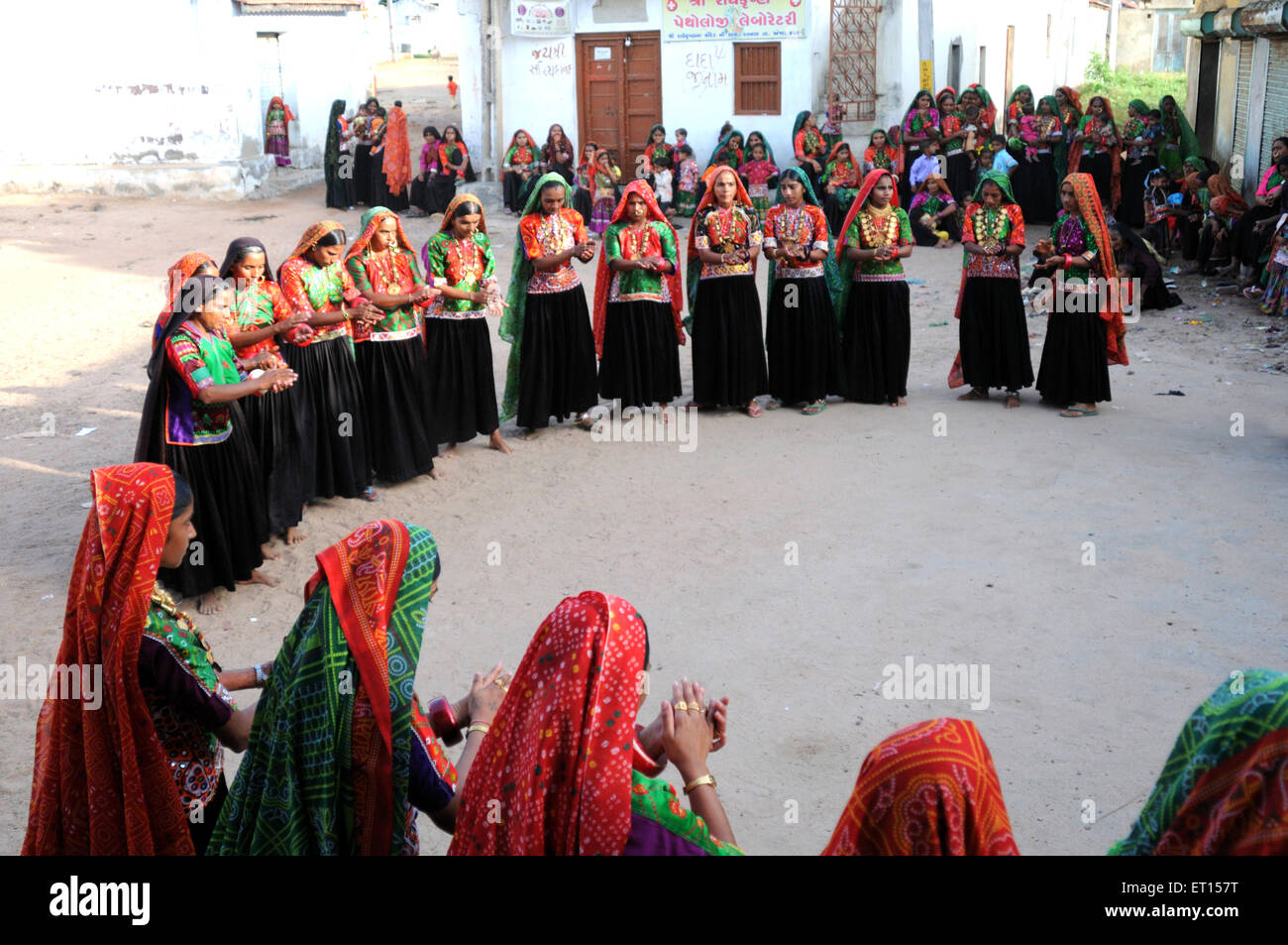 Rural women performing garbas during saatam aatham puja celebration at Mindiyada near Anjaar ; Kutch ; Gujarat ; India Stock Photo