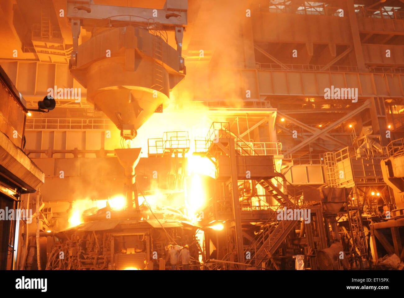 Pouring molten iron, steel plant, Essar steel, Hajira, Hazira, Surat, Gujarat,  India, Asia Stock Photo