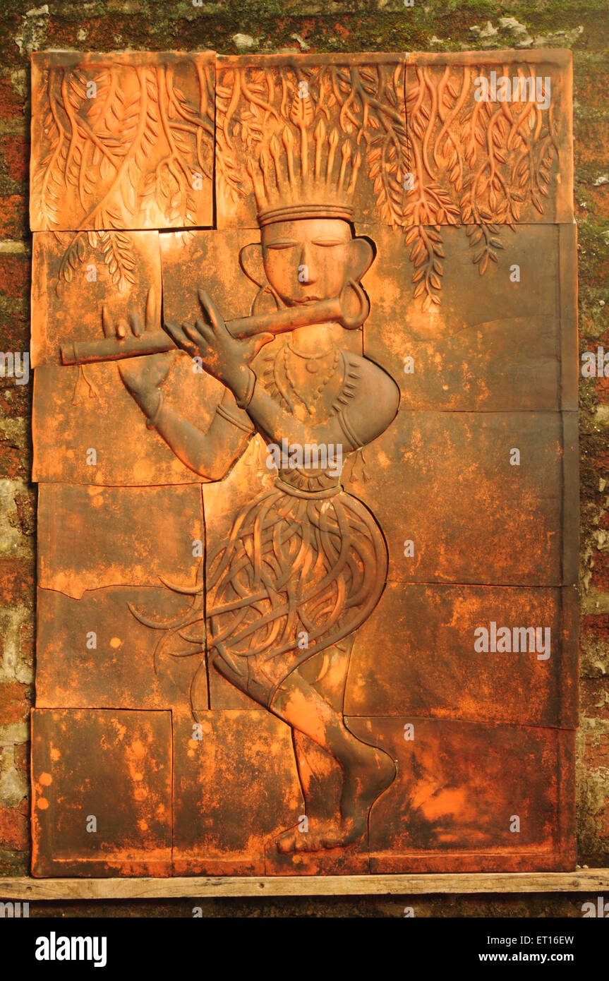 Terracotta sculptures painting on wall Stock Photo