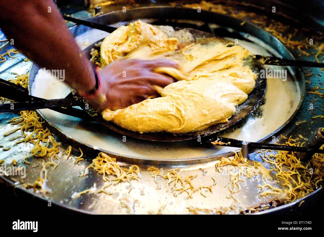Hand kneading potato dough ; Bikaner ; Rajasthan ; India Stock Photo