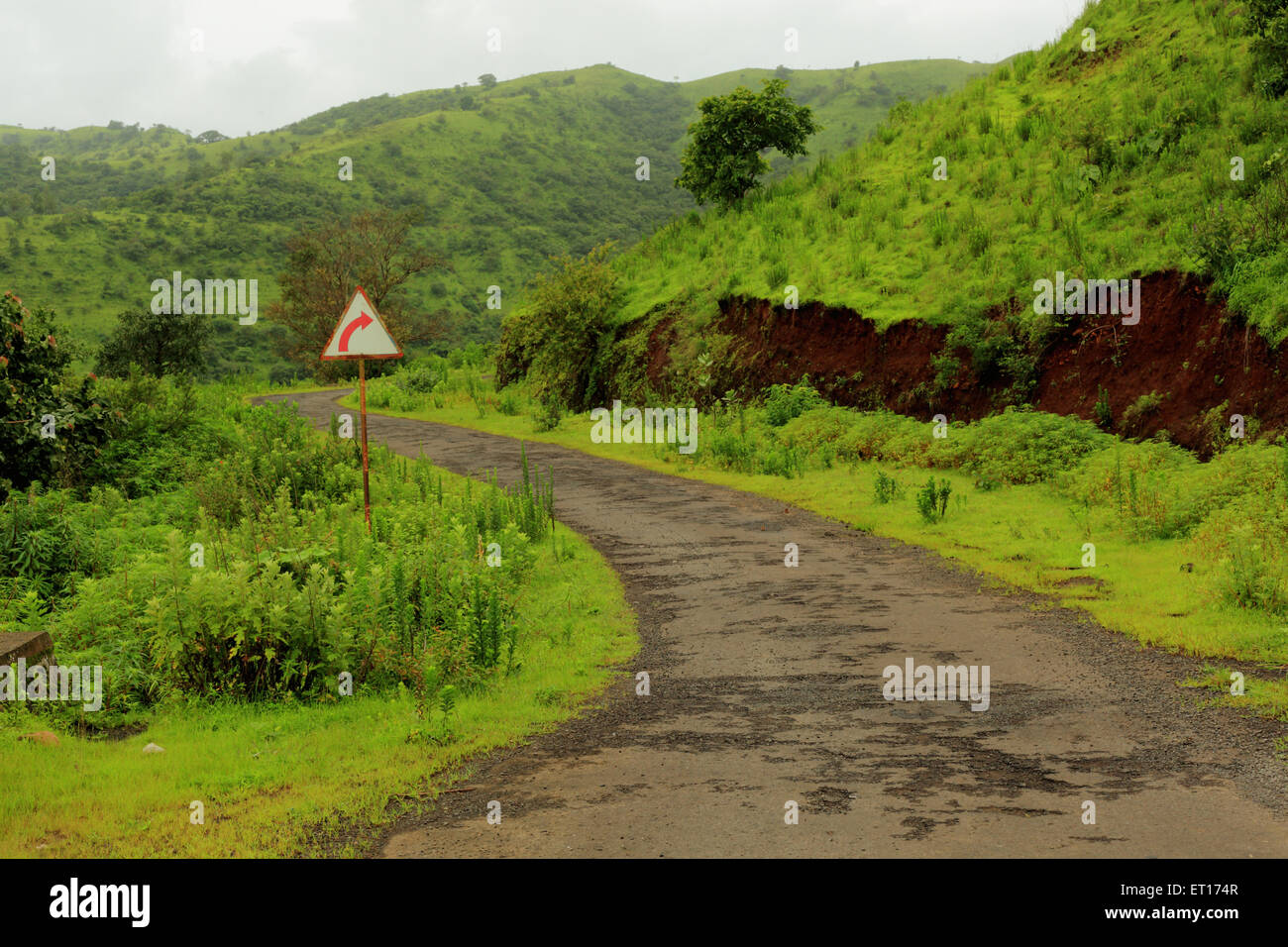 road with right turn sign near Pune Maharashtra India Asia Stock Photo