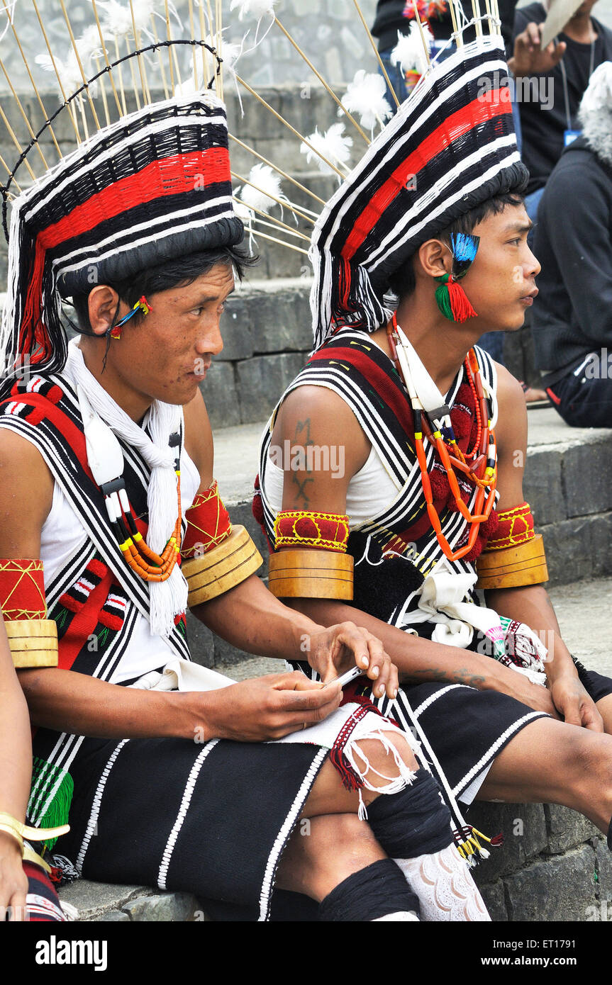 Naga tribe men at hornbill festival ; Kohima ; Kisama village ; Nagaland ; North East ; India NOMR Stock Photo