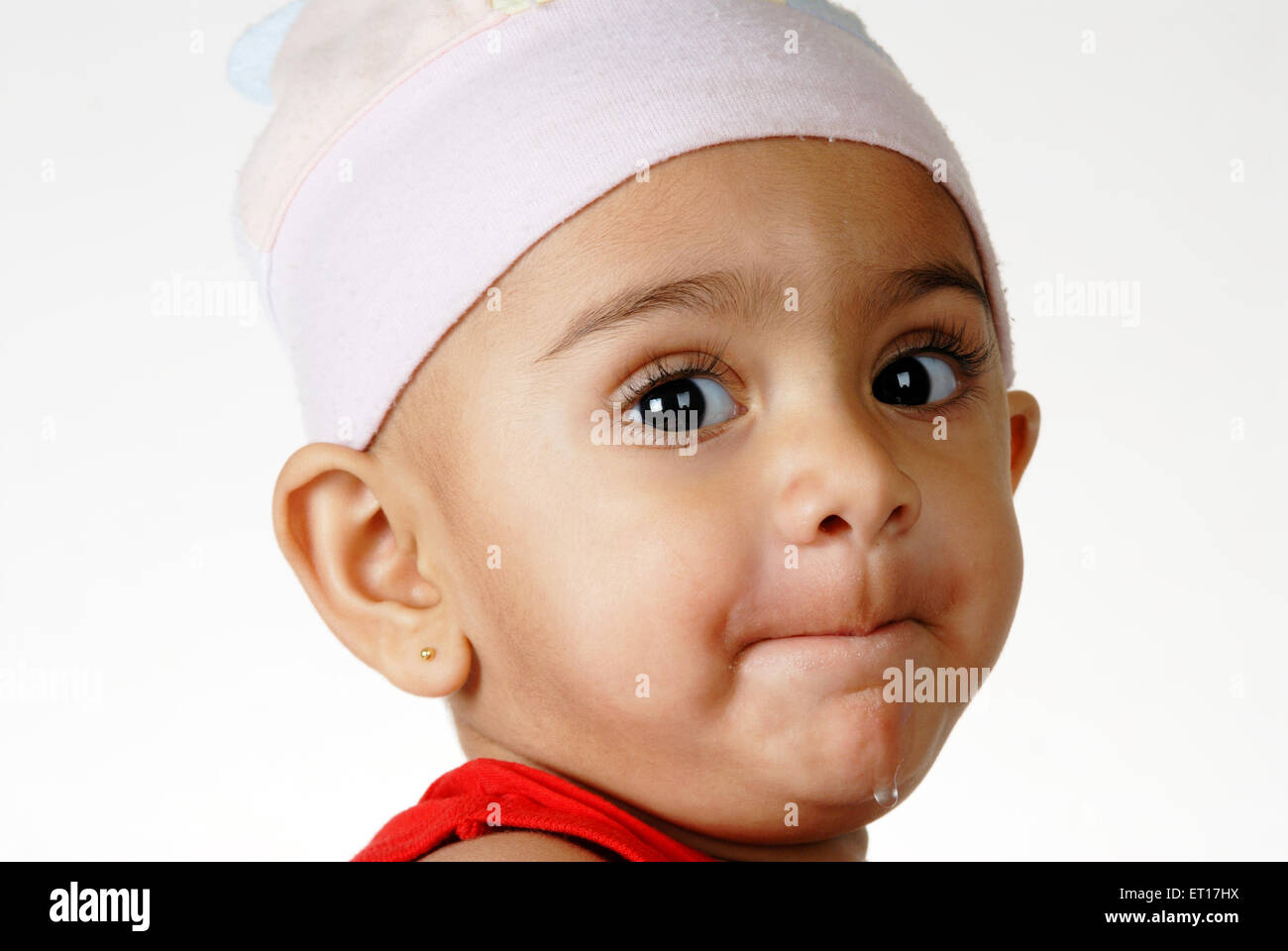 Indian baby boy lips pressed looking at camera India -  MR#512 - RMM 150201 Stock Photo