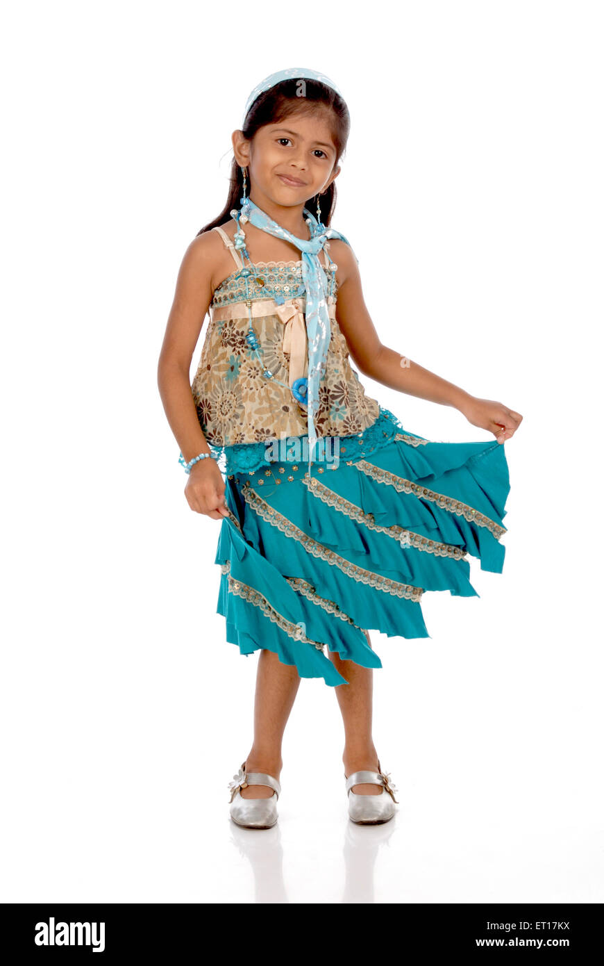 Girl wearing blue modern dress dancing 