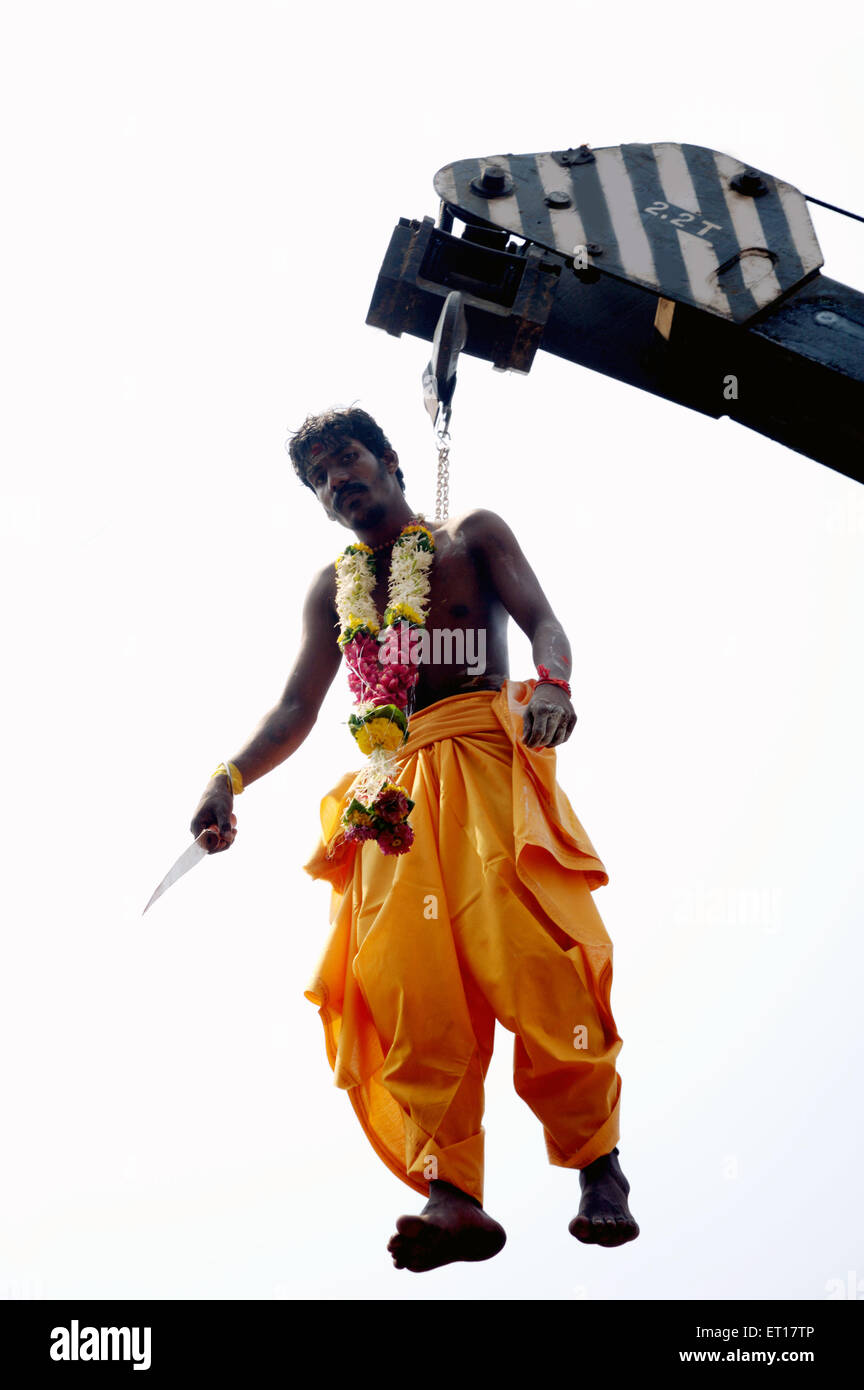 Man hanging on hook Murugan festival Ayyappa Mumbai Maharashtra India Asia  Stock Photo - Alamy