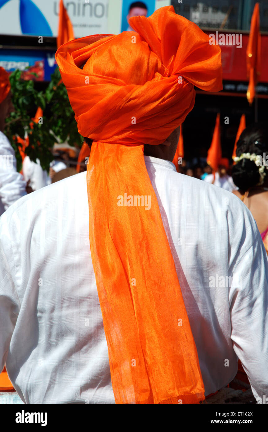 Man wearing saffron turban Mumbai Maharashtra India Asia Stock Photo