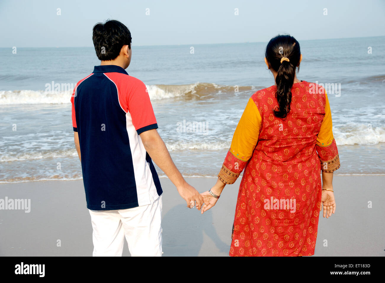 Two woman walking backview hi-res stock photography and images - Alamy