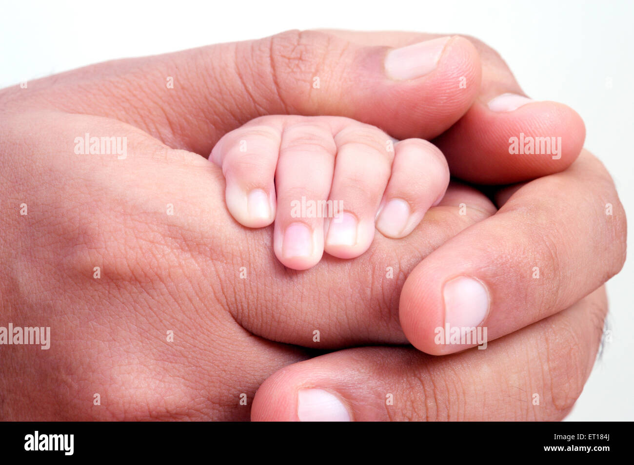 protection, protecting, care, love, caring, man father holding hand of new born baby, MR#736J&LA Stock Photo